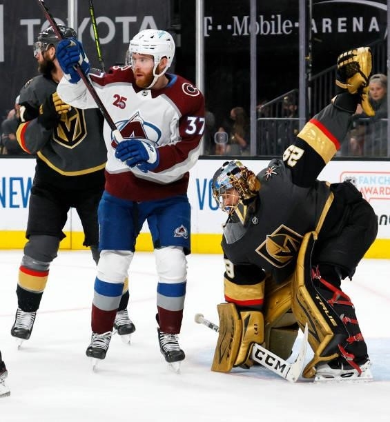 Marc-Andre Fleury of the Vegas Golden Knights regains his balance after J.T. Compher of the Colorado Avalanche ran into hiim in the first period in...