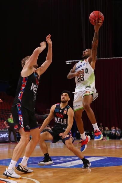 Ben Moore of the Phoenix shoots during game one of the NBL Semi-Final Series between Melbourne United and the South East Melbourne Phoenix at Qudos...