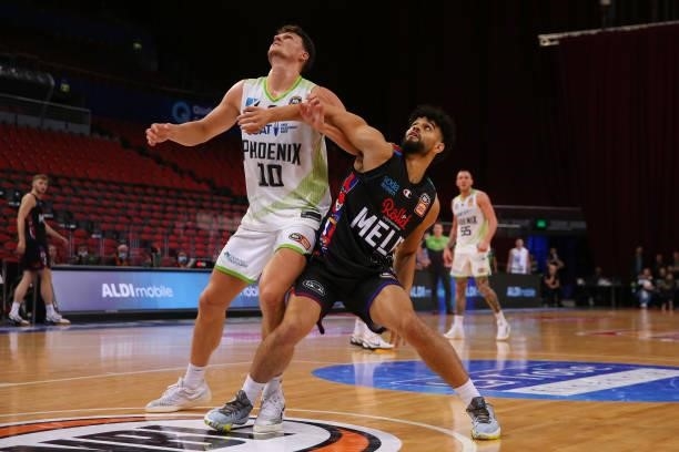 Yanni Wetzall of the Phoenix and Sam McDaniel of United compete for the ball during game one of the NBL Semi-Final Series between Melbourne United...
