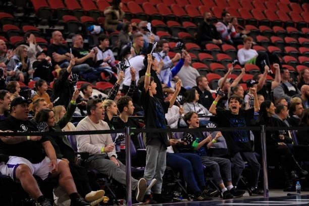 United fans cheer during game one of the NBL Semi-Final Series between Melbourne United and the South East Melbourne Phoenix at Qudos Bank Arena, on...