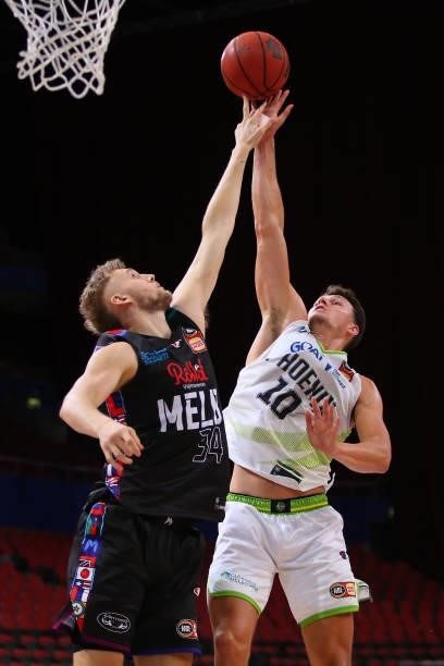 Yanni Wetzall of the Phoenix shoots under pressure from Jock Landale of United during game one of the NBL Semi-Final Series between Melbourne United...