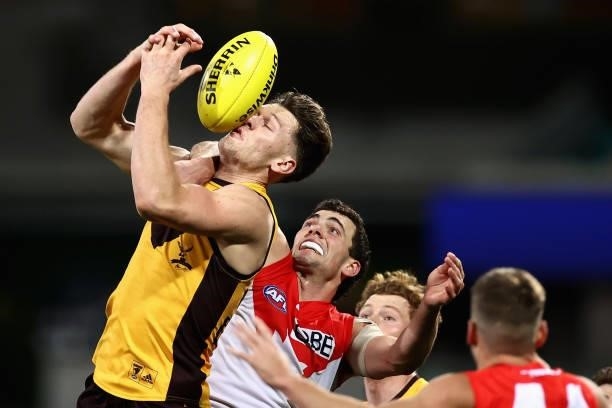 Jacob Koschitzke of the Hawks attempts to mark during the round 13 AFL match between the Sydney Swans and the Hawthorn Hawks at Sydney Cricket Ground...