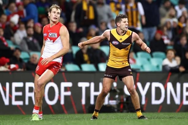 Luke Breust of the Hawks celebrates kicking a goal during the round 13 AFL match between the Sydney Swans and the Hawthorn Hawks at Sydney Cricket...