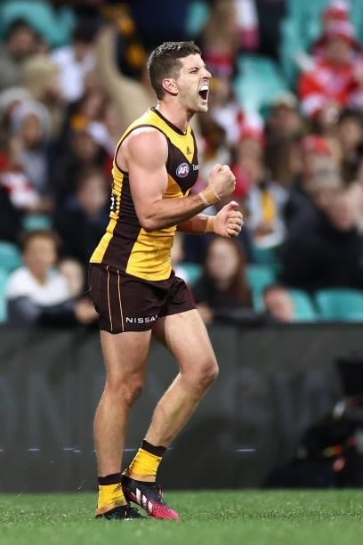 Luke Breust of the Hawks celebrates kicking a goal during the round 13 AFL match between the Sydney Swans and the Hawthorn Hawks at Sydney Cricket...