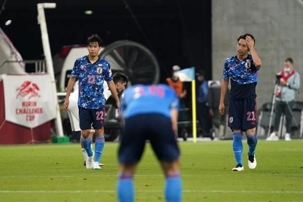 Miki Yamane and Hayao Kawabe of Japan react after their 1-0 victory in the international friendly match between Japan and Serbia at Noevir Stadium...
