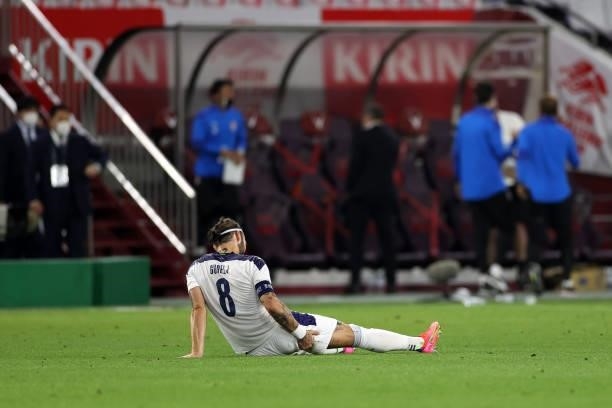 Nemanja Gudelj of Serbia reacts after his side's 0-1 defeat in the international friendly match between Japan and Serbia at Noevir Stadium Kobe on...