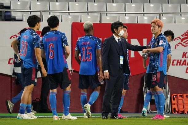 Head coach Hajime Moriyasu of Japan congratulates his players after the 1-0 victory in the international friendly match between Japan and Serbia at...