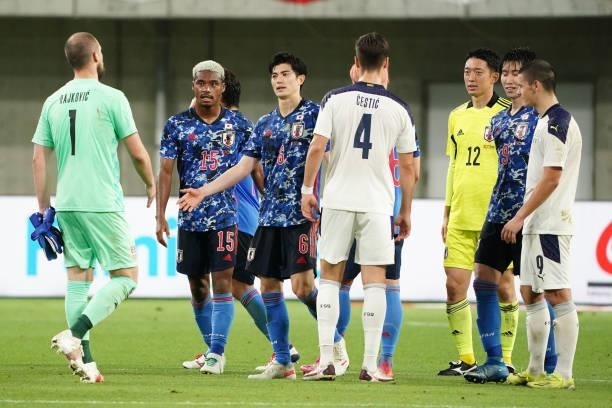Players react after the international friendly match between Japan and Serbia at Noevir Stadium Kobe on June 11, 2021 in Kobe, Hyogo, Japan.