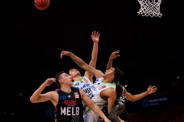 Players compete for the ball during game one of the NBL Semi-Final Series between Melbourne United and the South East Melbourne Phoenix at Qudos Bank...