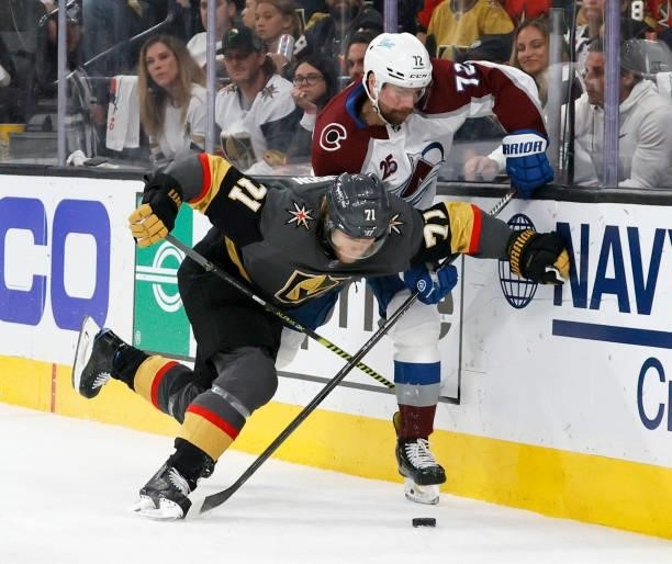 William Karlsson of the Vegas Golden Knights and Joonas Donskoi of the Colorado Avalanche fight for the puck in the third period in Game Six of the...
