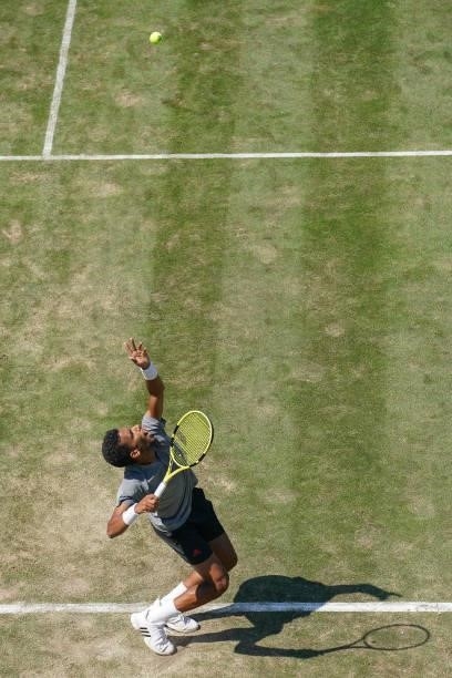 Felix Auger-Aliassime of Canada makes a serivce during his match against Ugo Humbert of France during day 5 of the MercedesCup at Tennisclub...