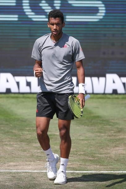Felix Auger-Aliassime of Canada celebrates during his match against Ugo Humbert of France during day 5 of the MercedesCup at Tennisclub Weissenhof on...