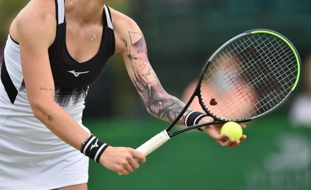 Close up of a tennis racket and ball as Tereza Martincova of Czech Republic prepares to serve against Nina Stojanovic of Belgium during the women's...