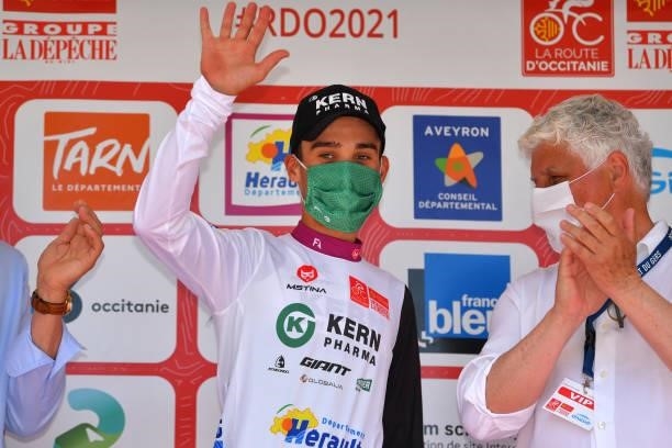 Jon Agirre Egaña of Spain and Equipo Kern Pharma and Equipo Kern Pharma White Best Young Rider Jersey celebrates at podium during the 45th La Route...