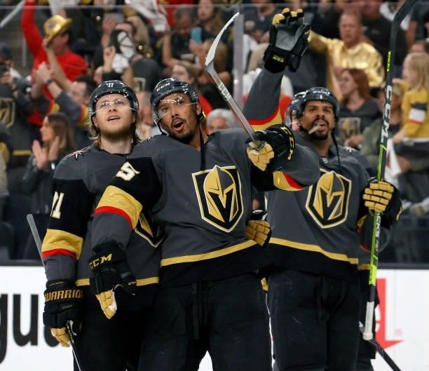 William Karlsson, Keegan Kolesar and Ryan Reaves of the Vegas Golden Knights celebrate after the team's 6-3 victory over the Colorado Avalanche to...