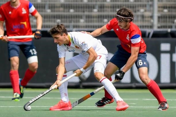 Marc Bolto of Spain, Francois Goyet of France during the Euro Hockey Championships match between Spain and France at Wagener Stadion on June 11, 2021...