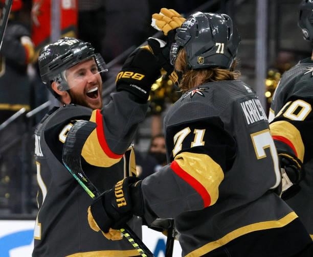 Jonathan Marchessault and William Karlsson of the Vegas Golden Knights celebrate the team's 6-3 victory over the Colorado Avalanche to win Game Six...