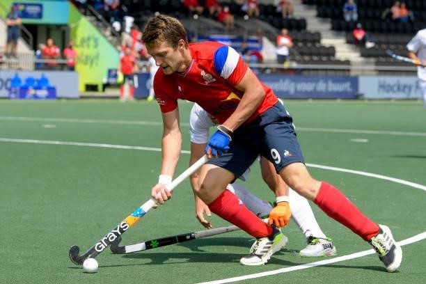 Blaise Rogeau of France, Marc Recasens of Spain during the Euro Hockey Championships match between Spain and France at Wagener Stadion on June 11,...