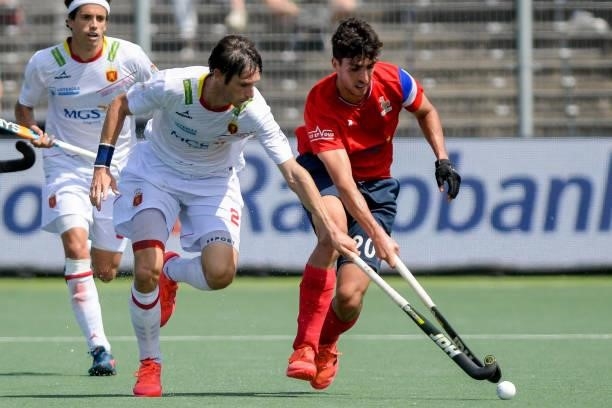 Vicenc Ruiz of Spain, Eliot Curty of France during the Euro Hockey Championships match between Spain and France at Wagener Stadion on June 11, 2021...