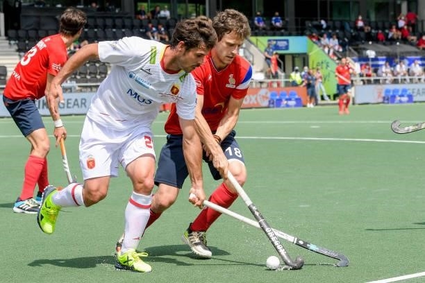 Pau Quemada of Spain, Jean-Baptiste Forgues of France during the Euro Hockey Championships match between Spain and France at Wagener Stadion on June...