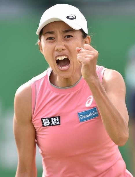 Shuai Zhang of China celebrates after winning a point against Kristina Mladenovic of France during the women's singles match on day seven at...