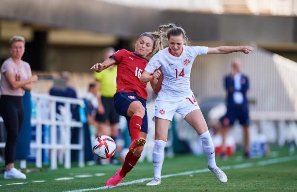 Gabrielle Carle of Canada competes for the ball with Marketa Ringelova of Czech Republic during the Women's International friendly match between...
