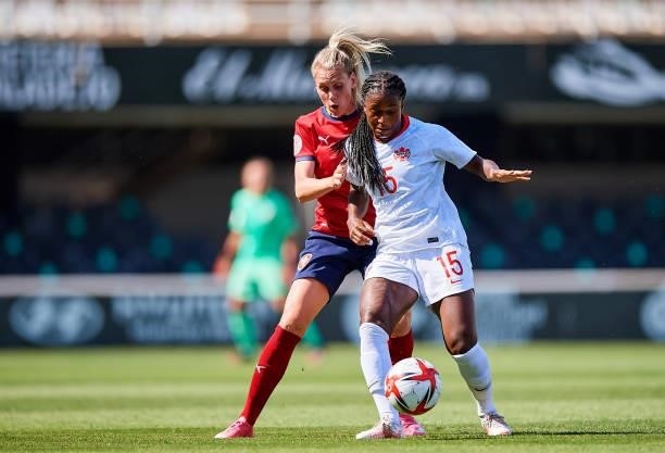Nichelle Prince of Canada competes for the ball with Petra Bertholdova of Czech Republic during the Women's International friendly match between...