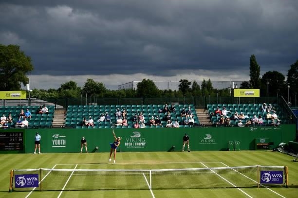 Kristina Mladenovic of France serves to Shuai Zhang of China during the women's singles match on day seven at Nottingham Tennis Centre on June 11,...
