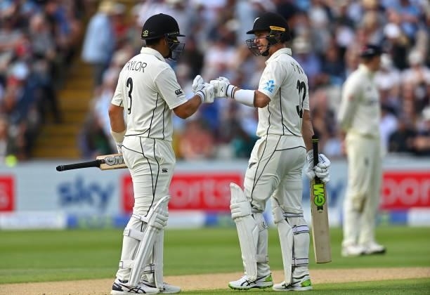 Will Young of New Zealand is congratulated on his half century by batting partner Ross Taylor during day two of the second Test Match at Edgbaston on...