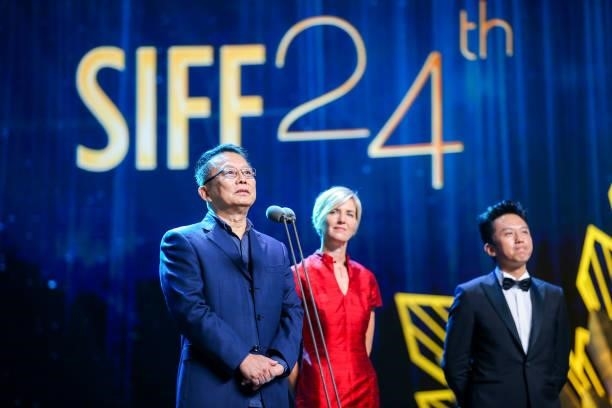 Jury members Director Huang Jianxin, French producer Natacha Devillers and actor Deng Chao attend opening ceremony of the 24th Shanghai International...