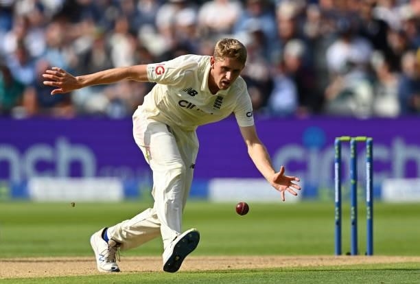 Olly Stone of England fields off his own bowling during day two of the second Test Match at Edgbaston on June 11, 2021 in Birmingham, England.