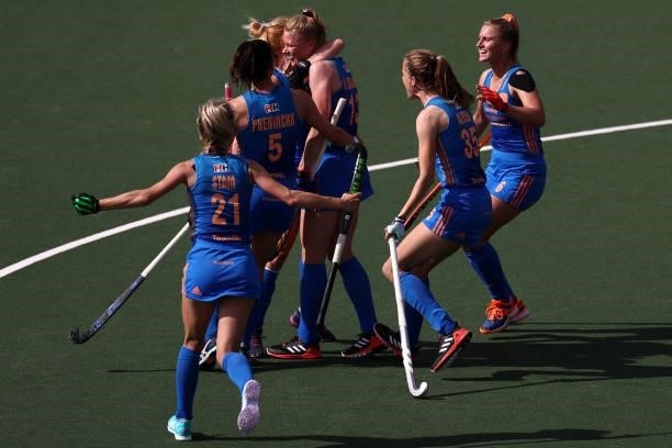Caia van Maasakker of Netherlands celebrates scoring her teams third goal of the game with team mates during the Euro Hockey Championships Womens...