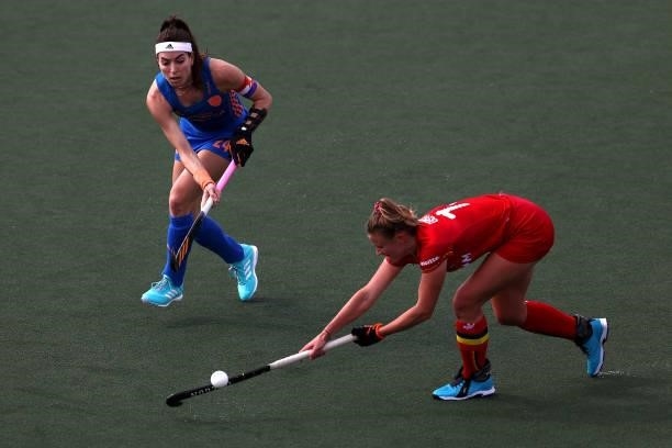 Eva de Goede of Netherlands battles for the ball with Alix Gerniers of Belgium during the Euro Hockey Championships Womens Semi Final match between...