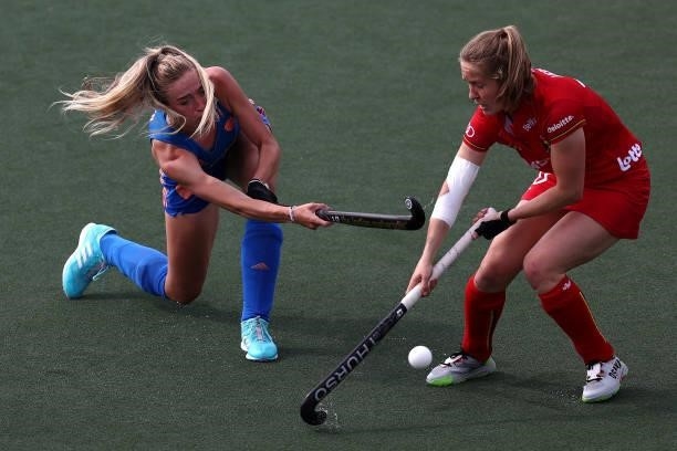Sanne Koolen of Netherlands battles for the ball with Louise Versavel of Belgium during the Euro Hockey Championships Womens Semi Final match between...