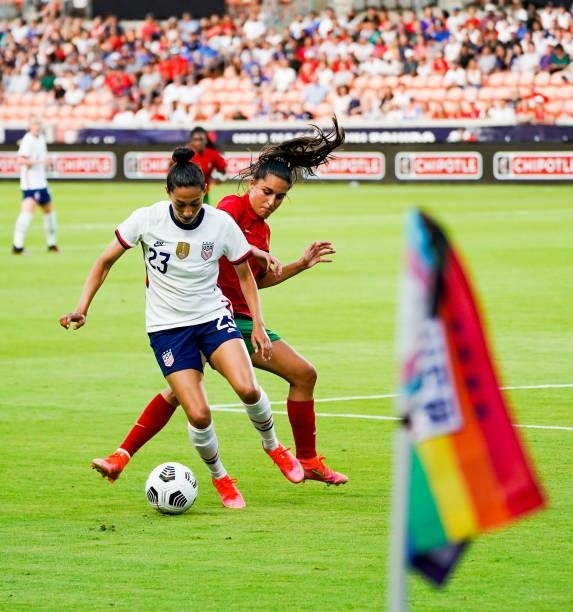 Christen Press of United States battles for the ball with Francisca Nazareth of Portugal during the first half the 2021 WNT Summer Series friendly...