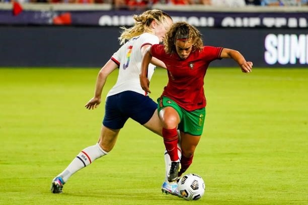 Andreia Norton of Portugal battles with Samantha Mewis of United States the 2021 WNT Summer Series friendly between the United States and Portugal at...