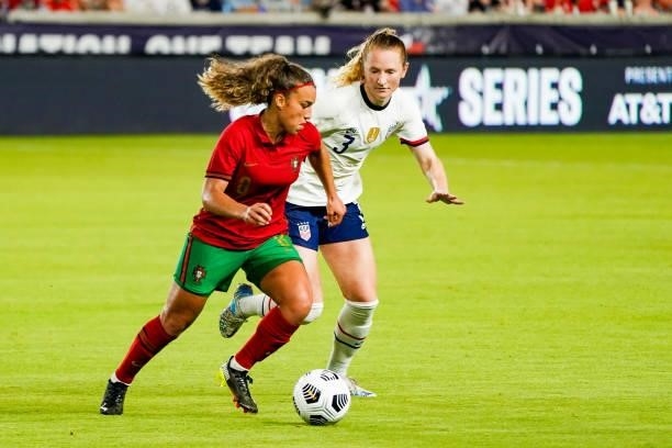 Andreia Norton of Portugal battles with Samantha Mewis of United States during the second half the 2021 WNT Summer Series friendly between the United...