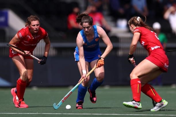 Marloes Keetels of Netherlands battles for the ball with Stephane Vanden Borre and Justine Rasir of Belgium during the Euro Hockey Championships...