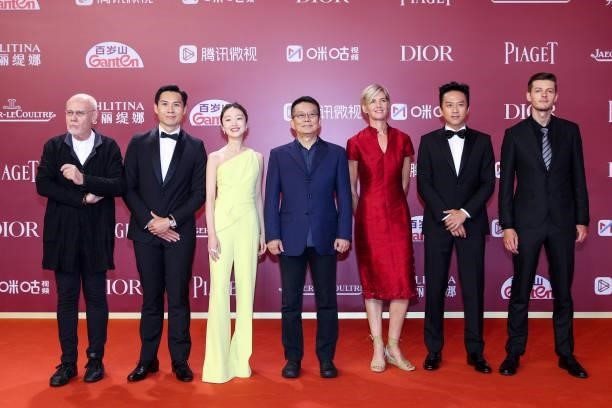 Jury members Italian producer Marco Muller, Singaporean director Anthony Chen, actress Zhou Dongyu, director Huang Jianxin, French producer Natacha...