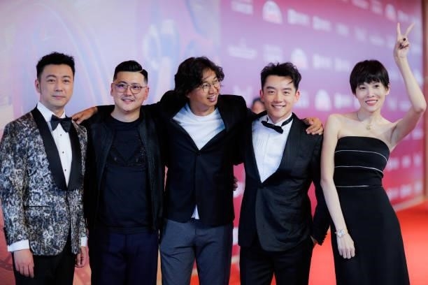 Actor Cao Bingkun , director Han Bowen , actor Zheng Kai and actress Zhang Lanxin attend opening ceremony of the 24th Shanghai International Film...