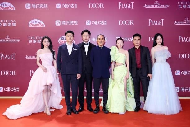 Actors Lin Boyang, Sun Yizhou, Lei Jiayin, director Zhang Yimou, Zhou Dongyu, Xu Yajun and Chen Tong attend opening ceremony of the 24th Shanghai...