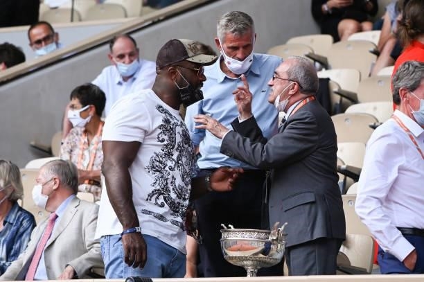 Teddy Riner, Gilles Moretton and Jean Gachassin attend the French Open 2021 at Roland Garros on June 11, 2021 in Paris, France.