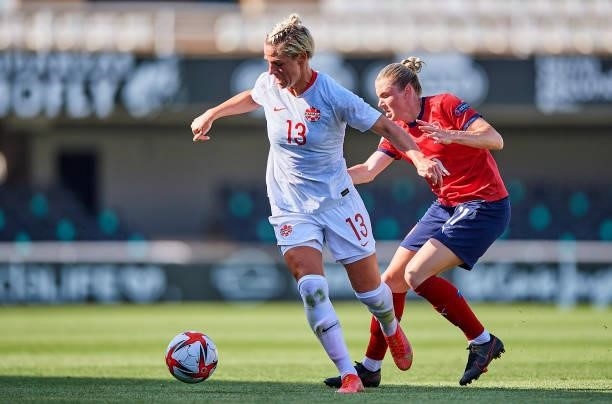 Sophie Schmidt of Canada competes for the ball with Tereza Krejcirikova of Czech Republic during the Women's International friendly match between...