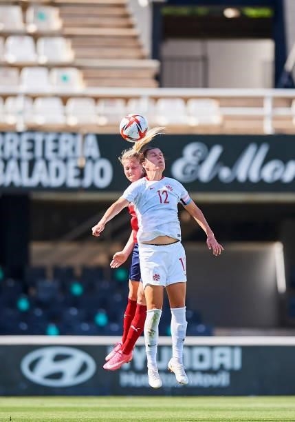 Christine Sinclair of Canada competes for the ball with Petra Bertholdova of Czech Republic during the Women's International friendly match between...