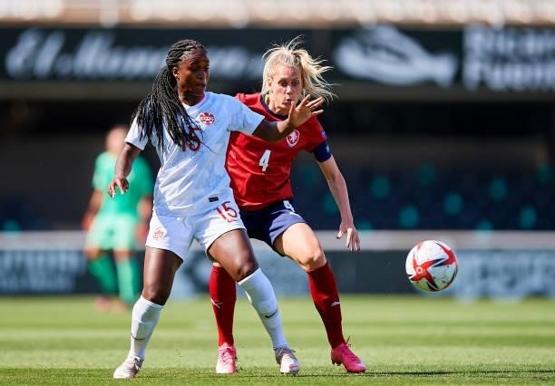 Nichelle Prince of Canada competes for the ball with Petra Bertholdova of Czech Republic during the Women's International friendly match between...