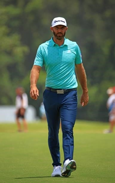 Dustin Johnson walks up the first fairway during the second round of the Palmetto Championship at Congaree on June 11, 2021 in Ridgeland, South...