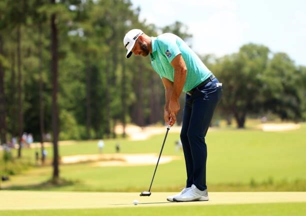 Dustin Johnson putts on the first green during the second round of the Palmetto Championship at Congaree on June 11, 2021 in Ridgeland, South...