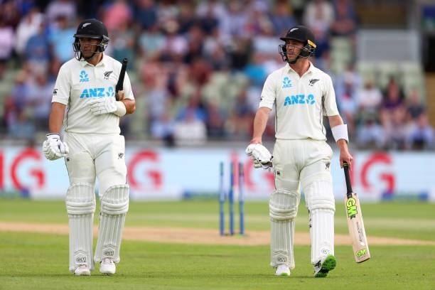 Will Young of New Zealand leaves the field after his dismissal before end of play with batting partner Ross Taylor of New Zealand during day two of...