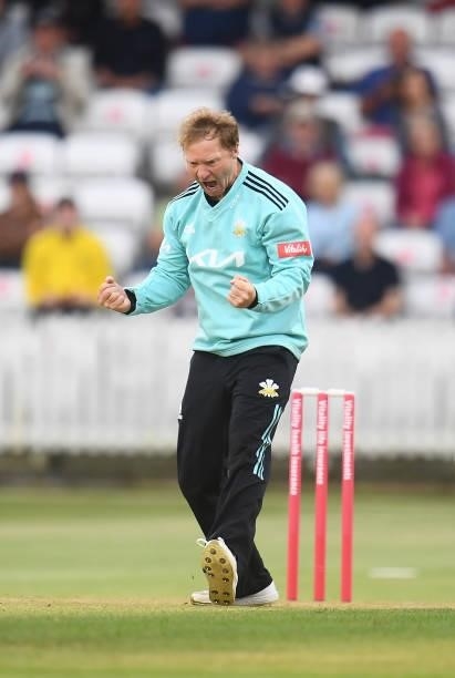 Gareth Batty of Surrey celebrates after taking the wicket of James Hildreth of Somerset during the Vitality T20 Blast match between Somerset and...