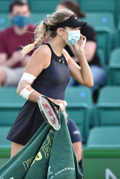 Katie Boulter of Great Britain wears a face mask during her match against Lauren Davis of United States in the women's singles match on day seven at...